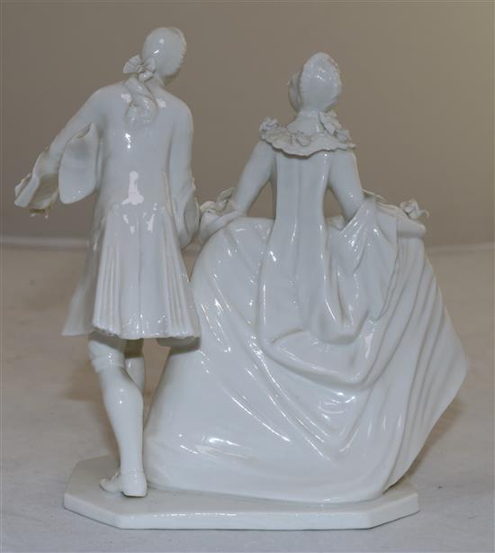 A Nymphenburg white glazed porcelain group of a lady and gentleman, after Bustelli, late 20th century, height 15.5cm (6.1in.)